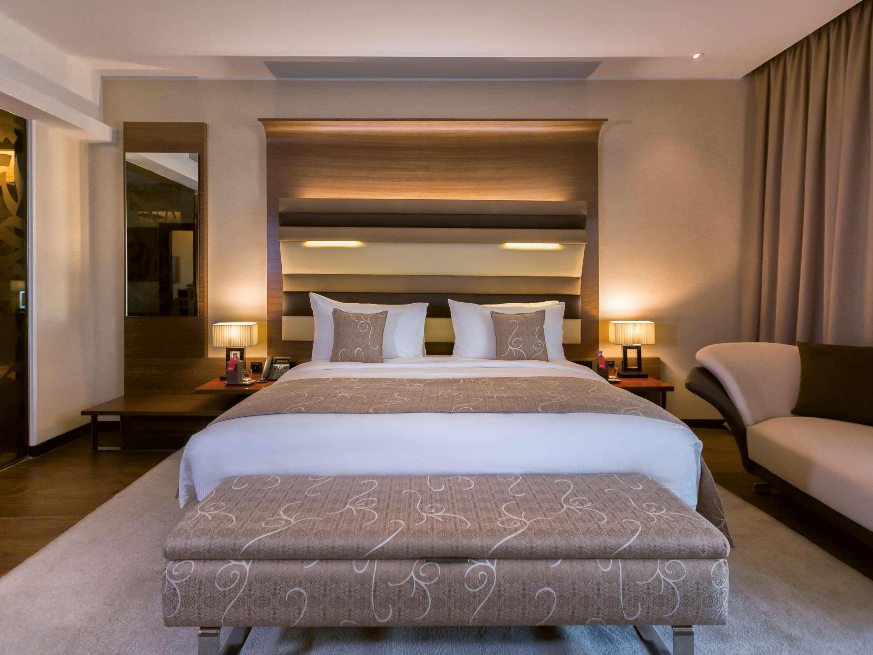 Moevenpick Hotel Du Lac Тунис Экстерьер фото A bedroom at the hotel