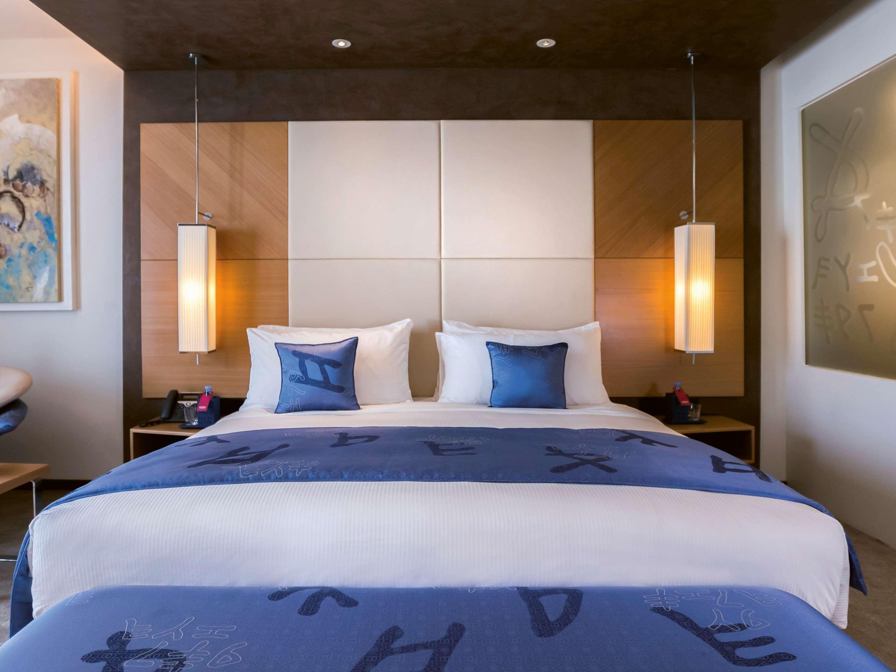 Moevenpick Hotel Du Lac Тунис Экстерьер фото A bedroom at the hotel