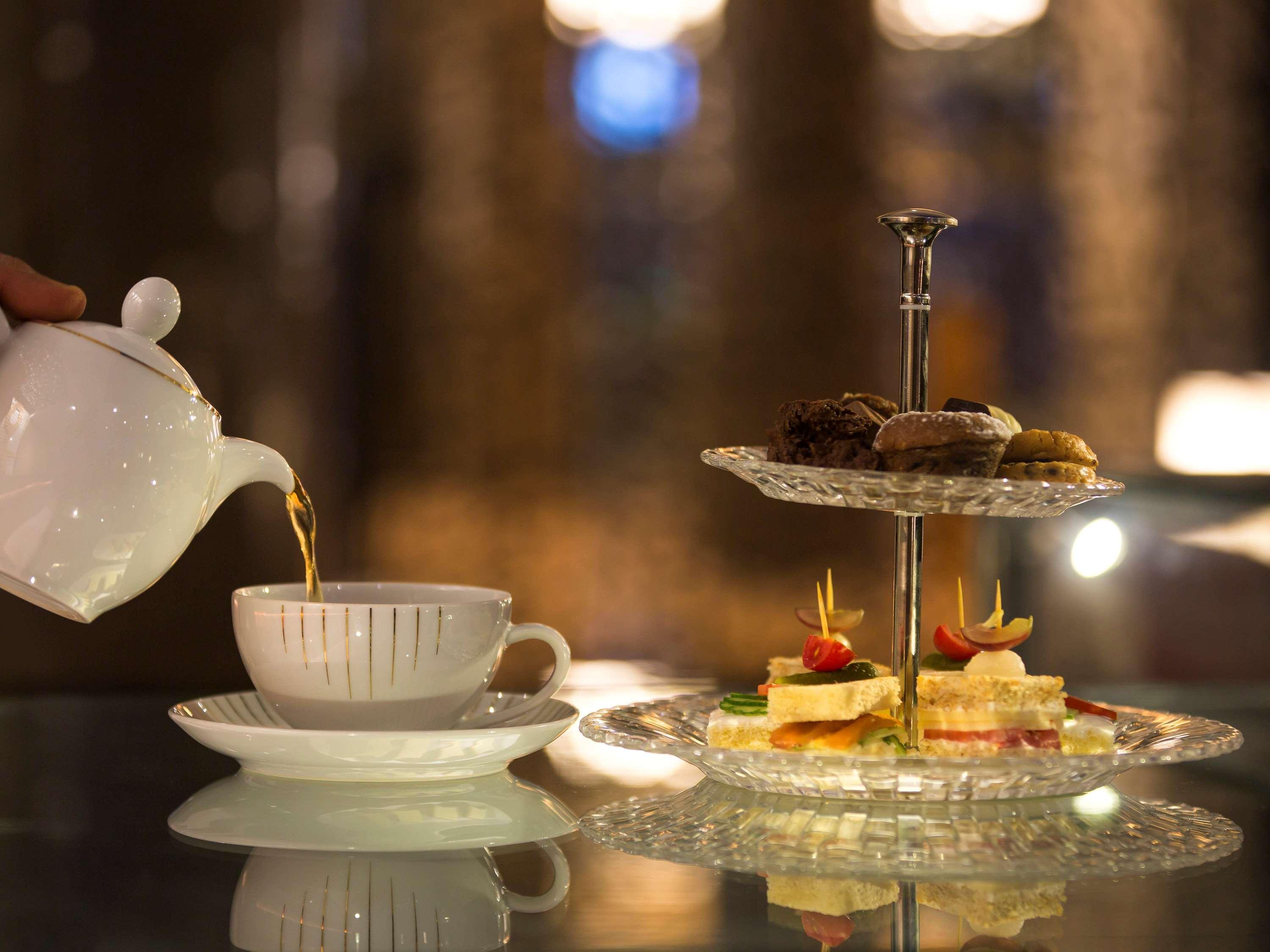 Moevenpick Hotel Du Lac Тунис Экстерьер фото Afternoon tea
