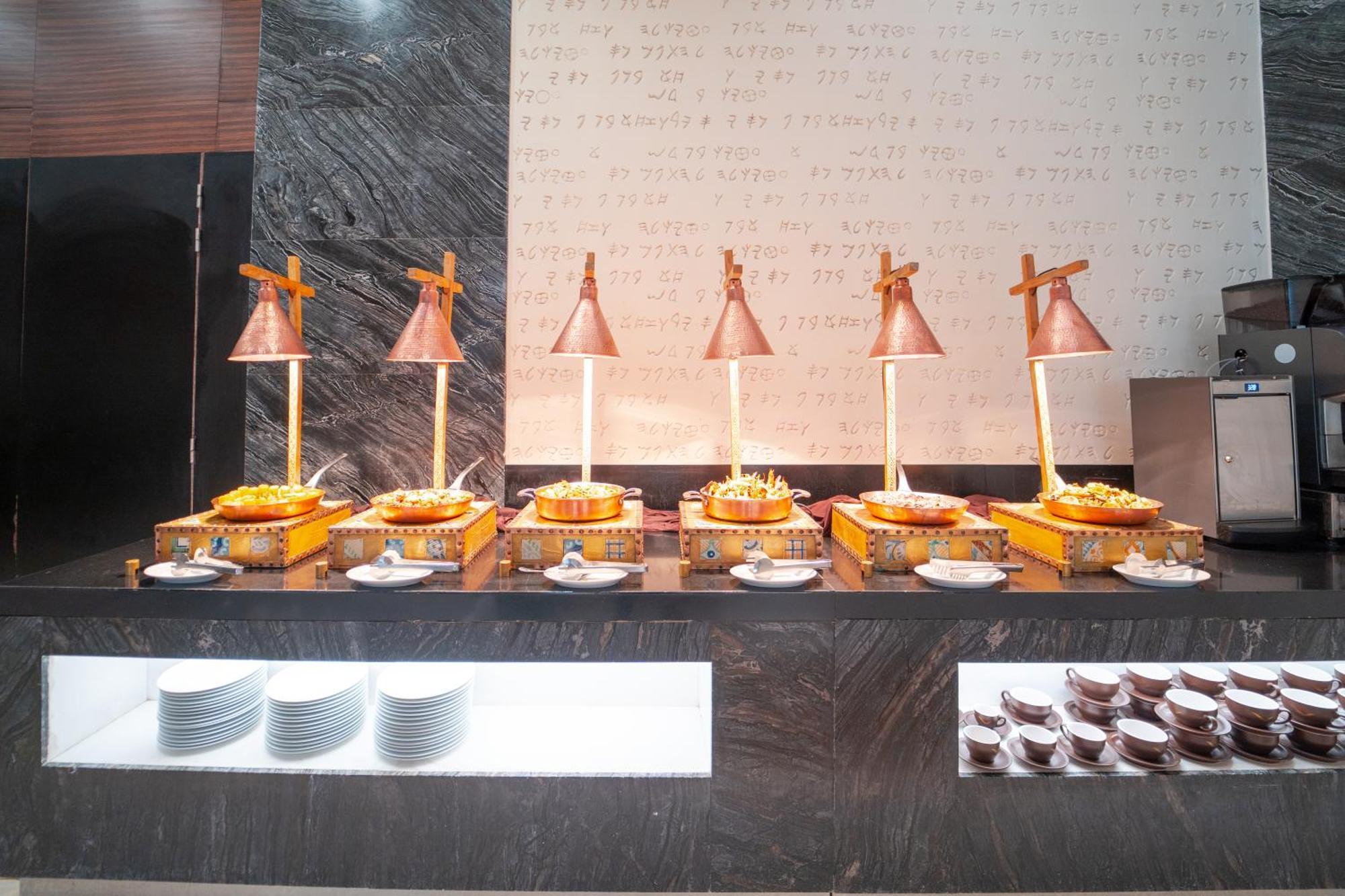 Moevenpick Hotel Du Lac Тунис Экстерьер фото A chafing dish